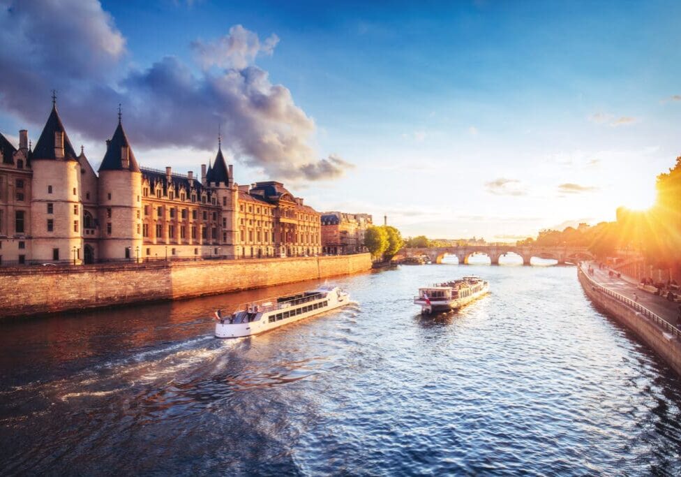 Dramatic sunset over Cite in Paris, France, with Conciergerie